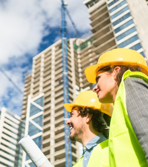 Melbourne Structural Engineers reviewing project drawings on site
